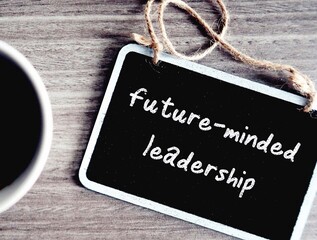 Chalkboard with text Future-minded Leadership, refers to leaders who prepare for multiple possible futures along with roadblocks setbacks and uncertainty along way