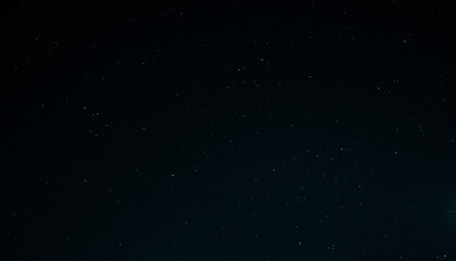 Night starry sky, dark blue space background with stars.