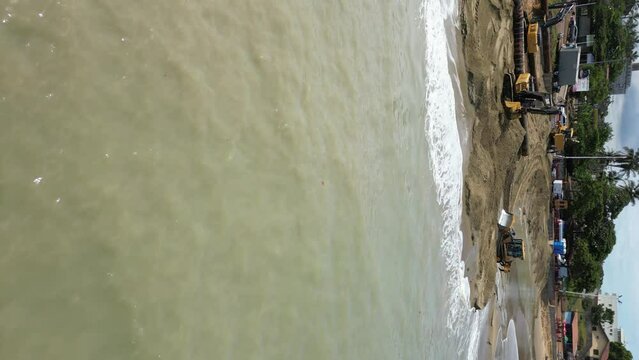 Guarapari, Esp&iacute;rito Santo, Brasil - 03 17 2023 - Imagem a&eacute;rea de obras de engorda da faixa de areia da Praia de Mea&iacute;pe no litoral do Esp&iacute;rito Santo. Obra de de dragagem e infraestrutura em Guarapari.