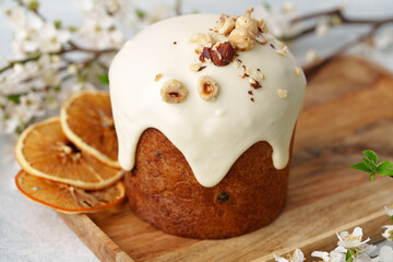 Traditional Easter cake with nuts on gray background