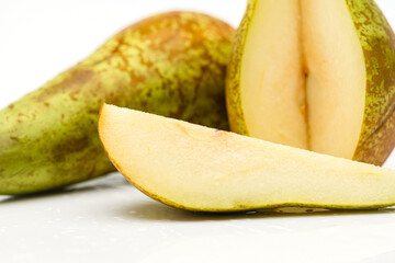 Fresh ripe pears on a white background.