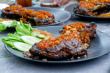 grilled tuna jaws served and placed on the table.