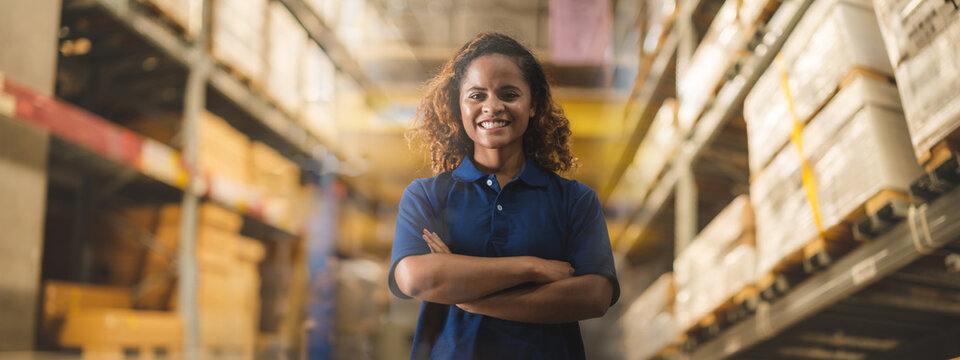 Industrial African American worker women in warehouse , worker people working in factory for stock checking. engineer foreman team control management. Business of logistics shipping industry concept
