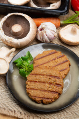 Tasty vegetarian burgers made from healthy quinoa, basil, portobello champignon and shiitake mushrooms