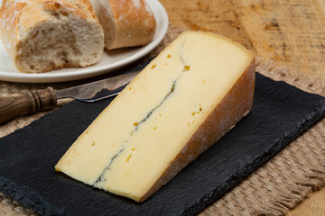 Cheese collection, French Morbier semi-soft cow milk cheese with black mold layer