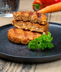 Tasty vegan burgers made from vegetarian plant based soya beans imitation meat