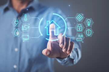 Smart Home and new technology to management the house, House intelligent control system concept, Hand shows the signs of smart home icon on dark background, Idea of new smart solution.