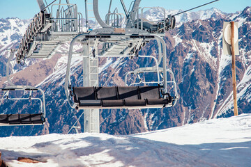 Naklejka premium Cable car in the beautiful winter snow mountains.