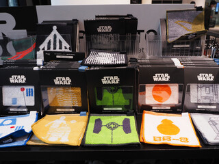 Obraz premium TOKYO, JAPAN - April 5, 2023: Star Wars mini towels in a Star Wars Mandalorian pop-up store in Tokyu Plaza shopping center.