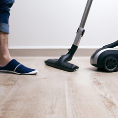 Image of the vacuuming process. Feet and a vacuum cleaner stand on the parquet floor. The image was created with Generative AI technology.