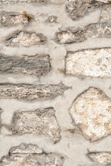 Grunge wall background with old stones texture