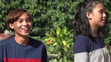 An Asian Teen Bullying And Teasing