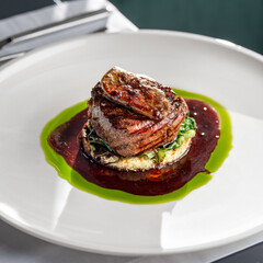 Tournedos Rossini. Foie gras, Black Angus beef tenderloin, with red wine sauce. Fillet mignon steak with Foie Gras. © izikmd
