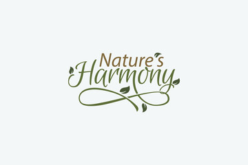 nature's harmony logo with a combination of beautiful nature's harmony lettering and floral elements.