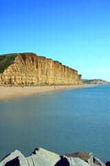 View along the beach and Jurassic Coast coastline, West Bay, Dorset, UK, Europe