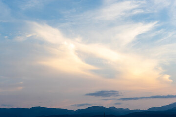 Fototapeta na wymiar きれいな透き通る夕日と雲