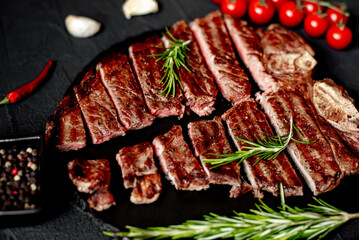grilled T-bone steak on stone background