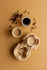 Different types of coffee to go in paper cup with cup holder