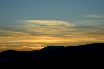 autumn sunrise behind the hills