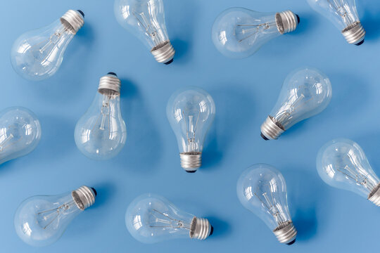 Collection of various light bulbs on blue background