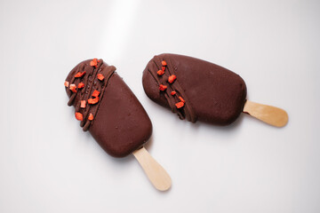 ice lolly with chocolate decorated with fruits