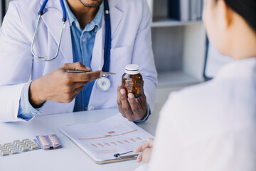 Medicine doctor working with digital medical interface icons on the hospital background, Medical technology and network concept.