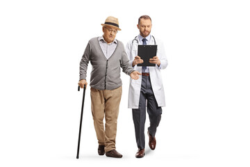 Full length portrait of an elderly man walking with a cane and talking to a young male doctor