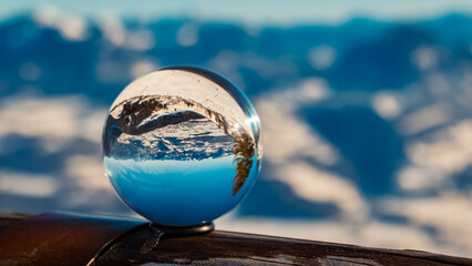 Crystal ball alpine landscape shot at Mount Rossbrand, Filzmoos, Salzburg, Austria