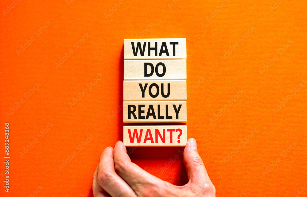 Wall mural what do you really want symbol. concept words what do you really want on wooden block. beautiful ora