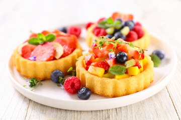 appetizing of berries fruits tart dessert assorted - obrazy, fototapety, plakaty