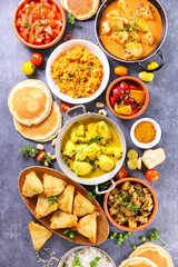 Fototapeta na wymiar assorted indian food selection- top view