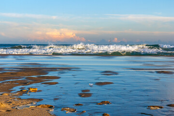 sunset of a strong swell in the mediterranean sea