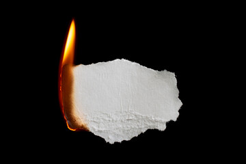 burning paper, glowing edge of paper on a black background