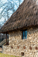 Old residential building in Village Museum in Bucharest, Romania
