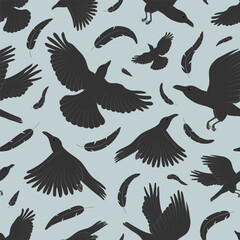 Seamless pattern with ravens and black feathers. Cute flying crow birds vector illustration