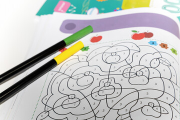 Fototapeta na wymiar Children activity book with pencils. Children development. High quality photo