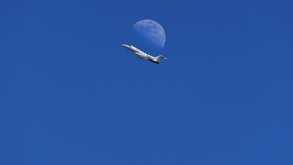 A Flight seen flying near a Moon in Connecticut