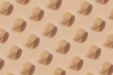 A Flurry of Petal-Adorned hazelnuts. A large collection of nuts arranged in the shape of food and drink, creating a mesmerizing display.