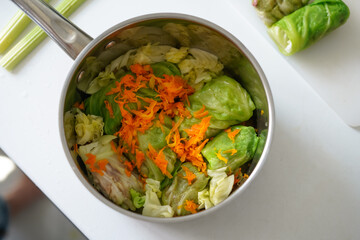 A bowl of raw, ready-to-cook cabbage rolls