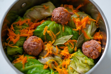 Traditional Ukrainian cabbage rolls with vegan minced meat in cabbage leaves and meatballs. Homemade recipes