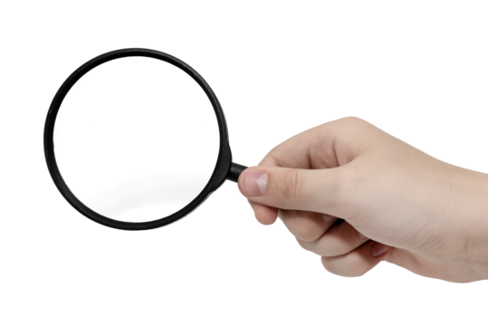 A hand holds a magnifying glass on a white background. magnifying glass