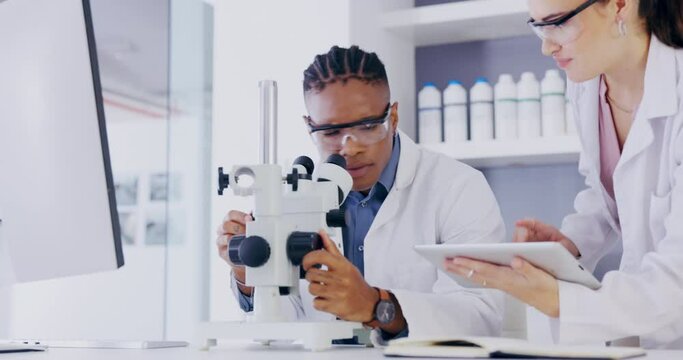 Coworking, Laboratory And Team With Microscope, Tablet And Advice, Man And Woman On Research Project Together. Discussion, Scientist In Training With Mentor And Lab Technician Checking Results Online