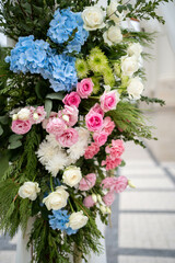 Beautiful Wedding ceremony event. Outdoor wedding arch. Green and white wedding decorations. Wedding day.