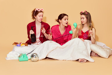 Expressing emotions to ex. Female friends, pretty young girls at sleepover, sitting under blanket,...