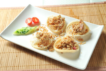 Lemongrass Pork and Shrimp Chips served in dish isolated of table top view fast food snacks