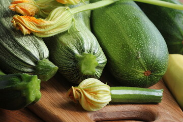 Fresh organic zucchini on the wooden table