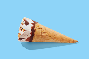 Strawberry cream with cone on blue pastel background