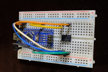 microcontroller programmed using development board on a breadboard