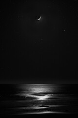 New moon over the sea