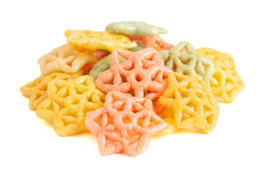 Cooked Star Shaped Fryums on a White Background